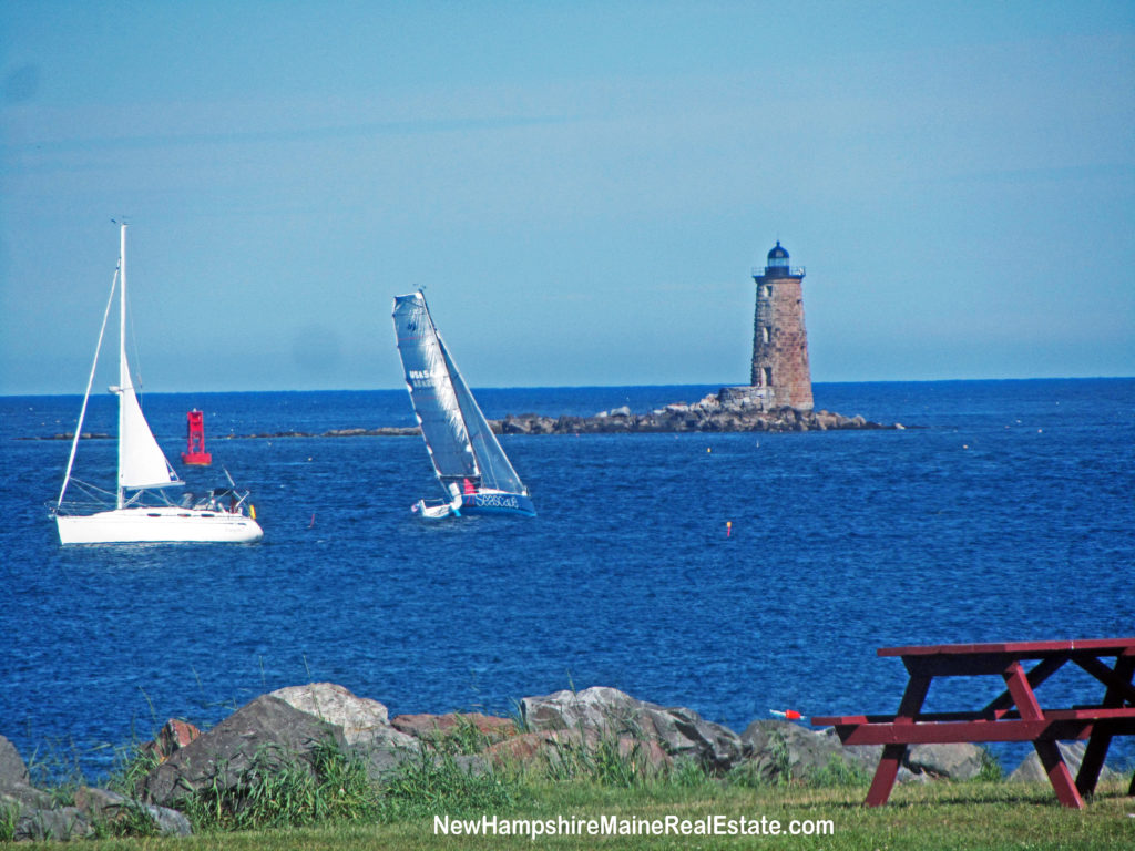 Whaleback Lighthouse and sailboats on the Atlantic Ocean